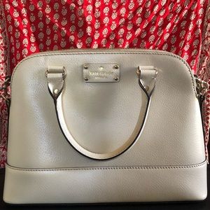 Kate Spade bag with crossbody strap inside. Used but in great condition.